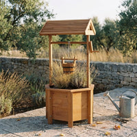 Jardinière puits Fontvieille — mise en situation dans un jardin